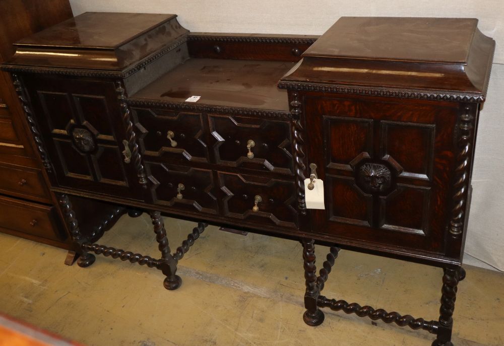 A 1920s Jacobean style oak sideboard, W.167cm, D.46cm, H.106cm